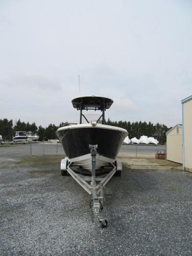 Slide: The Image of 2016 Carolina Skiff Sea Chaser 22 HFC on a trailer in a storage yard. - 2