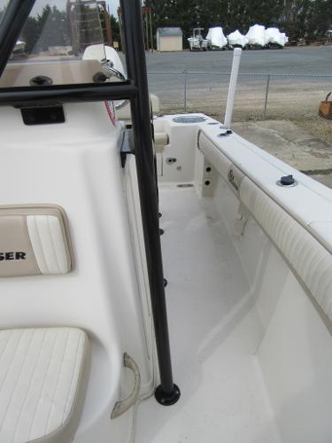 Slide: The Image of 2016 Carolina Skiff Sea Chaser 22 HFC boat interior, white seating and deck. - 7