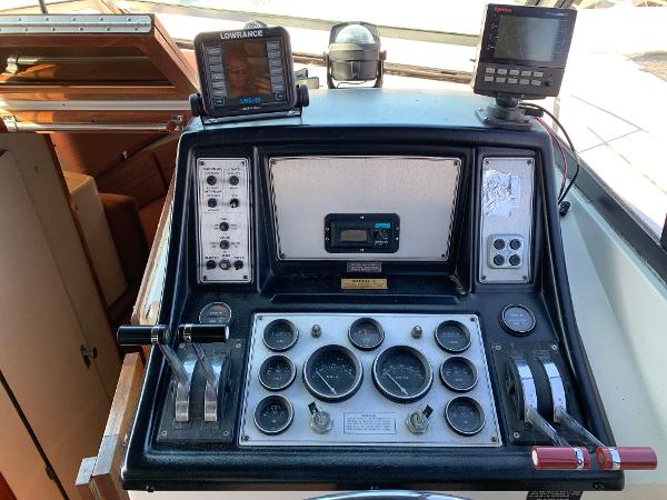 Slide: The Image of Control panel of a 1986 Carver 28 Riviera boat with navigation instruments. - 4