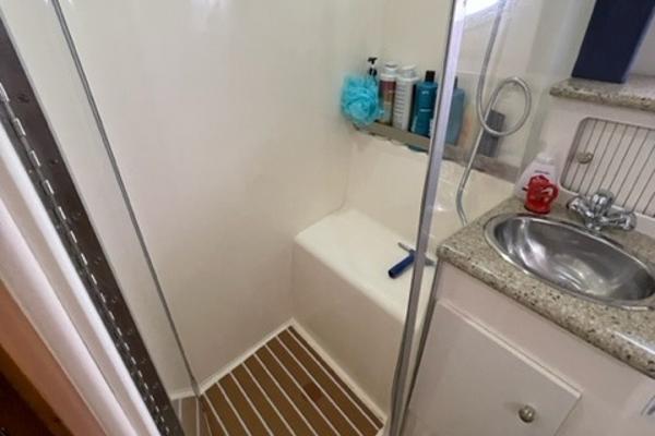 Slide: The Image of Bathroom interior of 2002 Carver 356 Motor Yacht with shower and sink. - 16