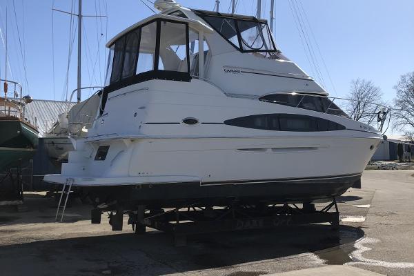 Slide: The Image of 2004 Carver 366 Motor Yacht on dry dock. - 1