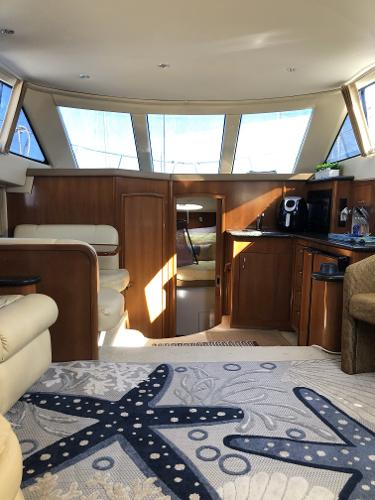 Slide: The Image of Interior of a 2004 Carver 366 Motor Yacht with modern amenities. - 13