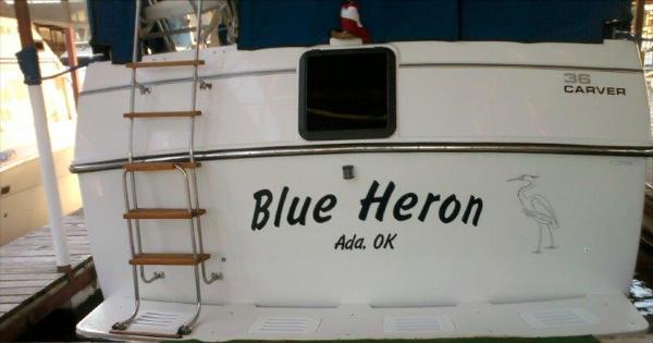 Slide: The Image of 1986 Carver 36 Aft Cabin boat named "Blue Heron" docked in Ada, OK. - 1