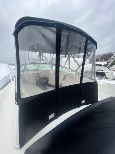 Slide: The Image of 2006 Carver 36 Mariner with enclosed flybridge on a cloudy day. - 12