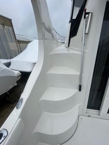 Slide: The Image of 2006 Carver 36 Mariner boat steps and deck area. - 15