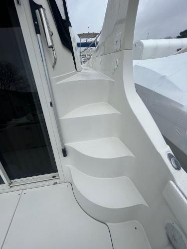 Slide: The Image of Staircase on a 2006 Carver 36 Mariner yacht, leading to the upper deck. - 16