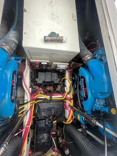 Slide: The Image of Engine compartment of a 2006 Carver 36 Mariner with Crusader engines. - 24