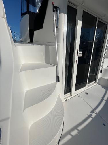 Slide: The Image of Staircase and sliding door on a 2006 Carver 36 Mariner yacht. - 33