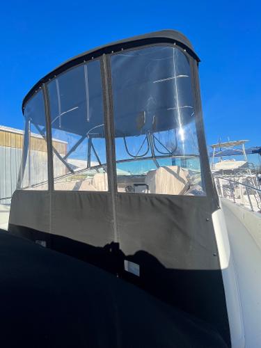 Slide: The Image of 2006 Carver 36 Mariner boat with enclosed flybridge. - 36