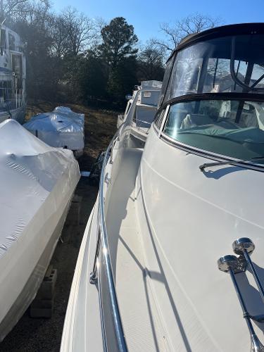Slide: The Image of 2006 Carver 36 Mariner yacht docked, side view. - 40