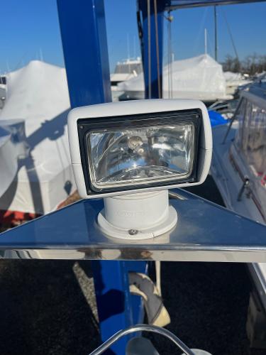 Slide: The Image of Close-up of a spotlight on a 2006 Carver 36 Mariner boat. - 41