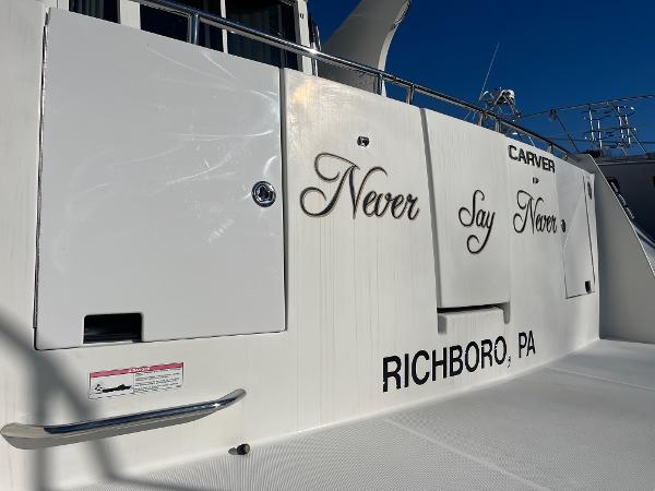 Slide: The Image of 2006 Carver 36 Mariner yacht with Never Say Never and Richboro, PA text. - 49