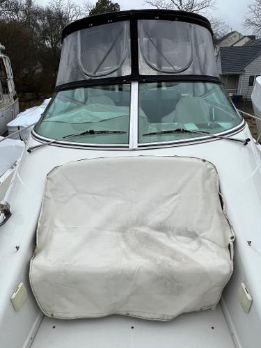 Slide: The Image of 2006 Carver 36 Mariner boat with covered bow seating area. - 7