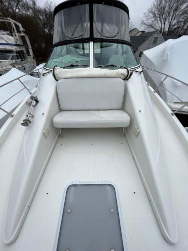 Slide: The Image of 2006 Carver 36 Mariner boat with white seating and windshield. - 8