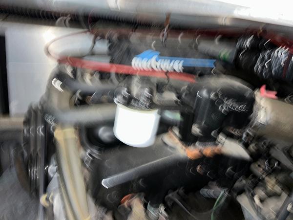 Slide: The Image of Blurry engine view of a 1992 Carver 38 Aft Cabin boat. - 19