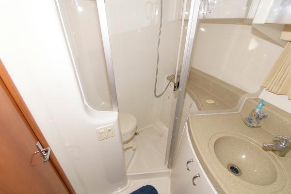 Slide: The Image of Bathroom in 2006 Carver 38 Super Sport yacht with shower, sink, and toilet. - 19