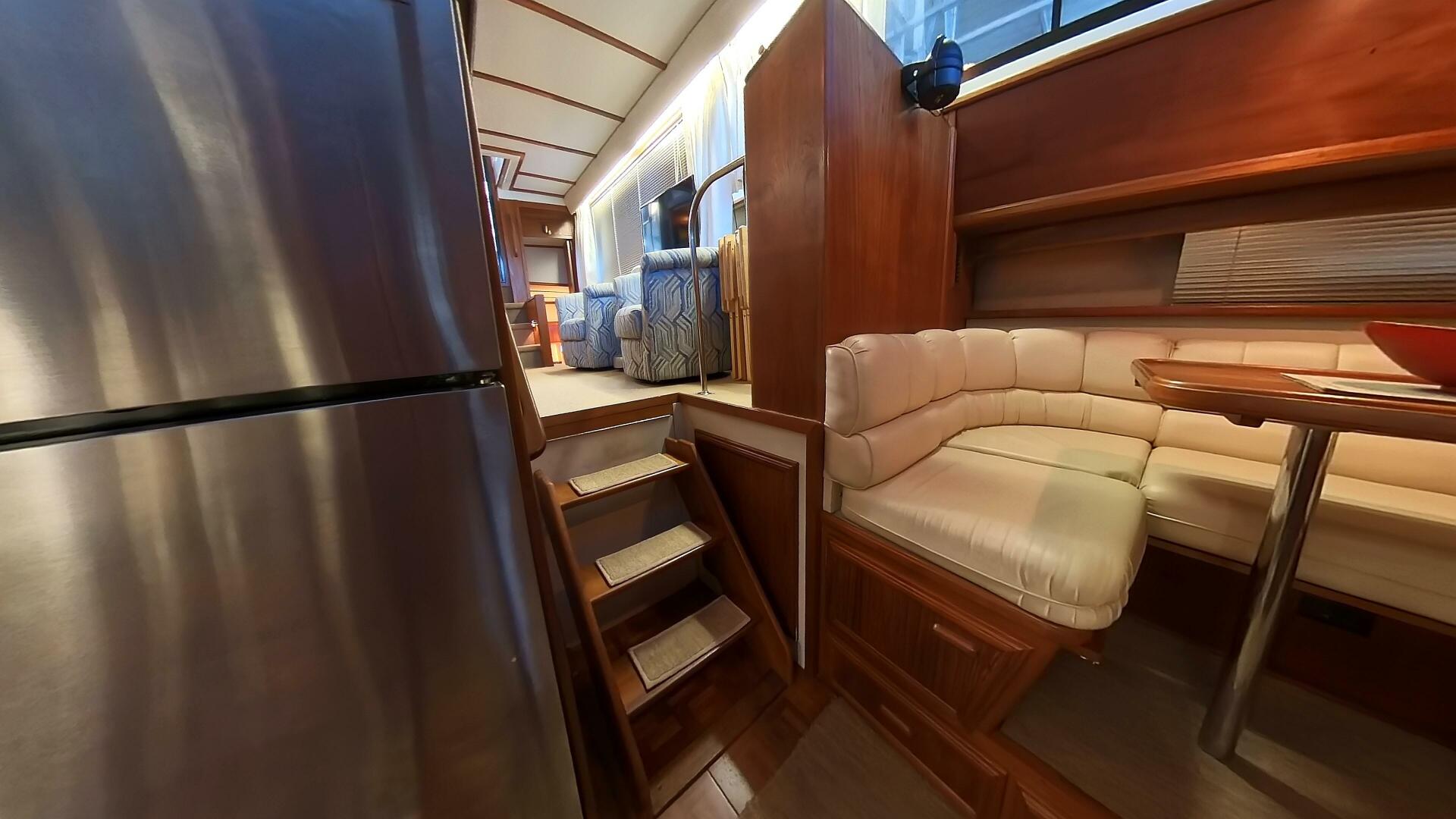 Slide: The Image of Carver 4207 - Flip up galley stairs to enter engine room - 5074099