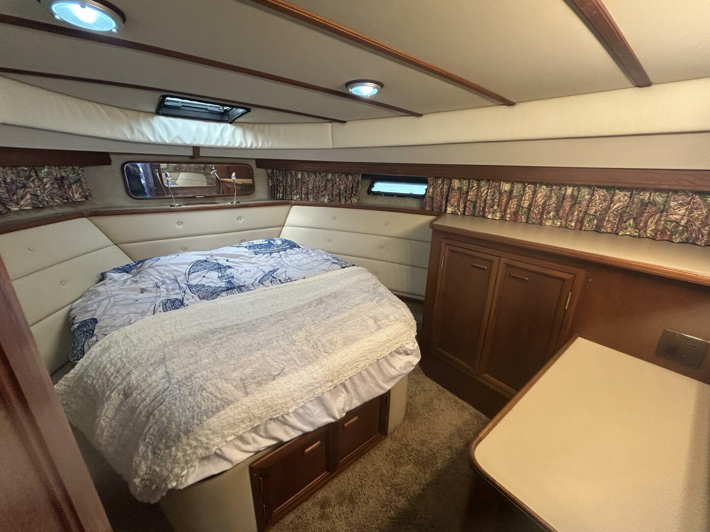 Slide: The Image of Queen Bed Primary Stateroom - 5061131