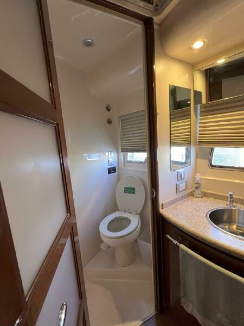 Slide: The Image of 2008 52 Carver Voyager - Chips Ahoy - Master Stateroom Head - 5180503