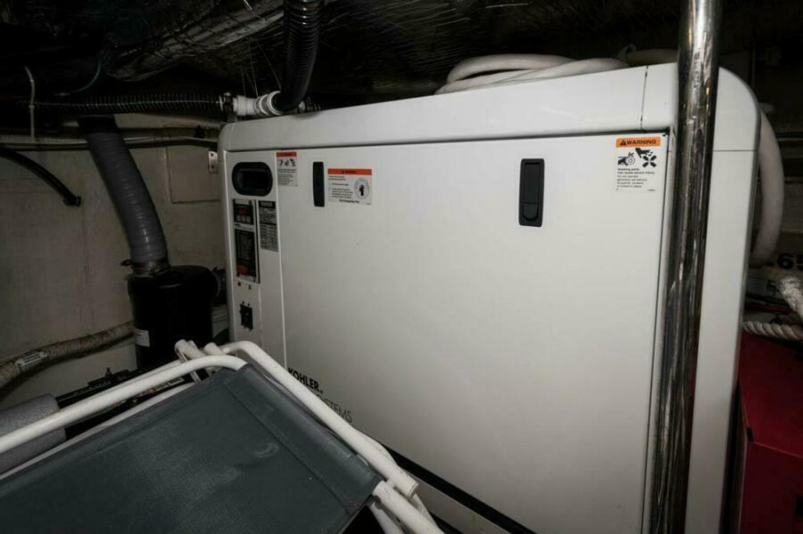 Slide: The Image of 2008 52 Carver Voyager - Chips Ahoy - Engine Room - Generator - 5180510