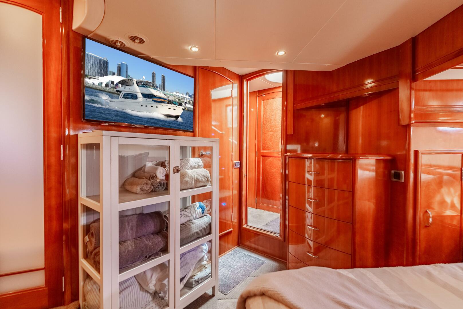 Slide: The Image of Carver 56 Master Stateroom TV and shelving - 5065062