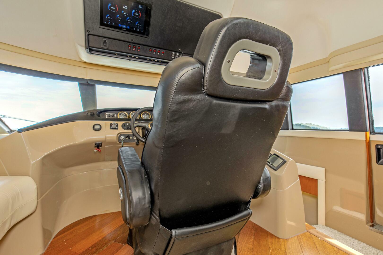 Slide: The Image of 2003 57' Carver 570 Voyager Beautiful Lower Helm (2) - 4317402