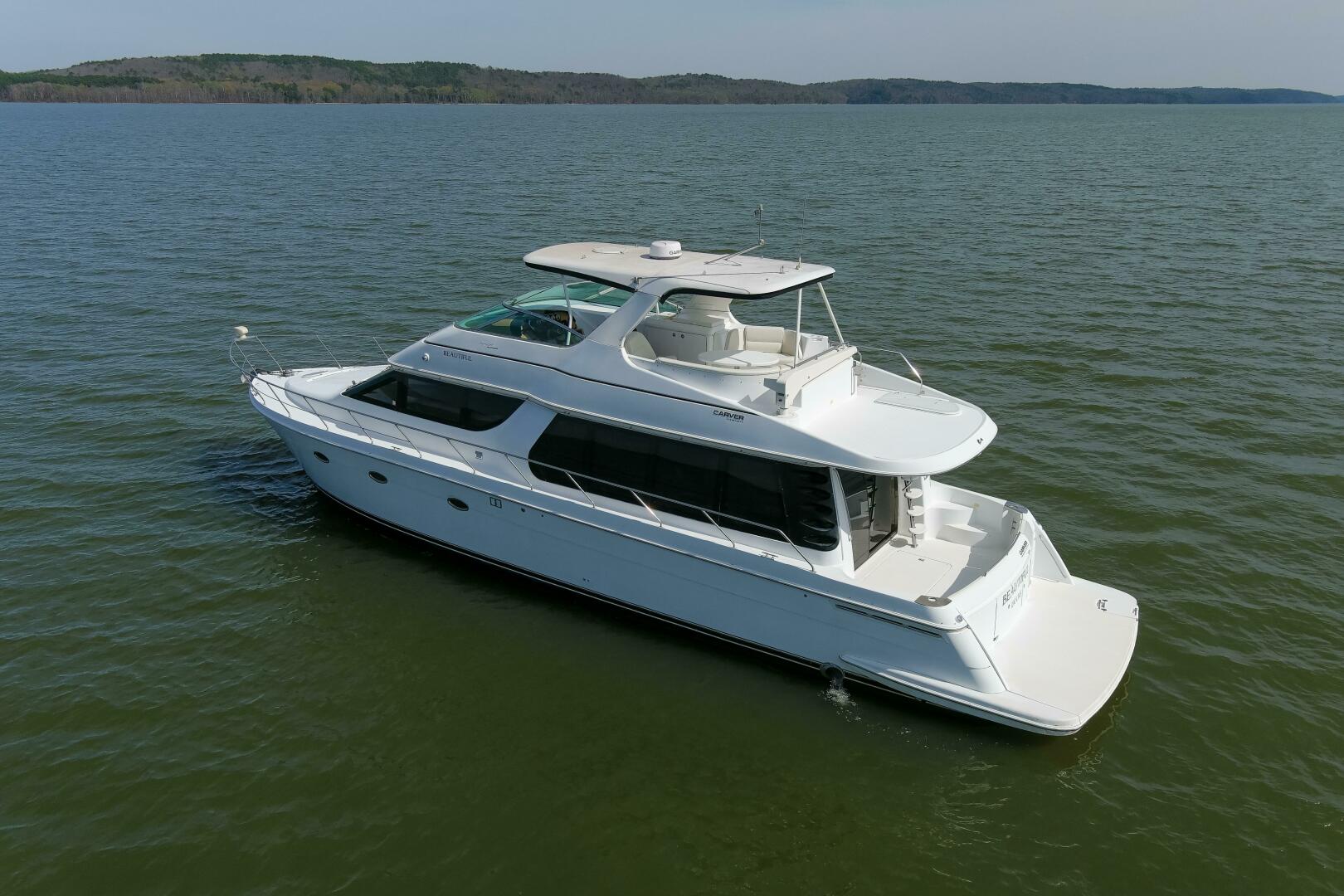 Slide: The Image of 2003 57' Carver 570 Voyager Beautiful Portside (2) - 4317408