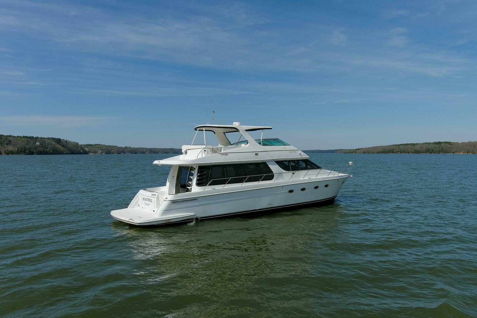 Slide: The Image of 2003 57' Carver 570 Voyager Beautiful Starboard Side - 4317410