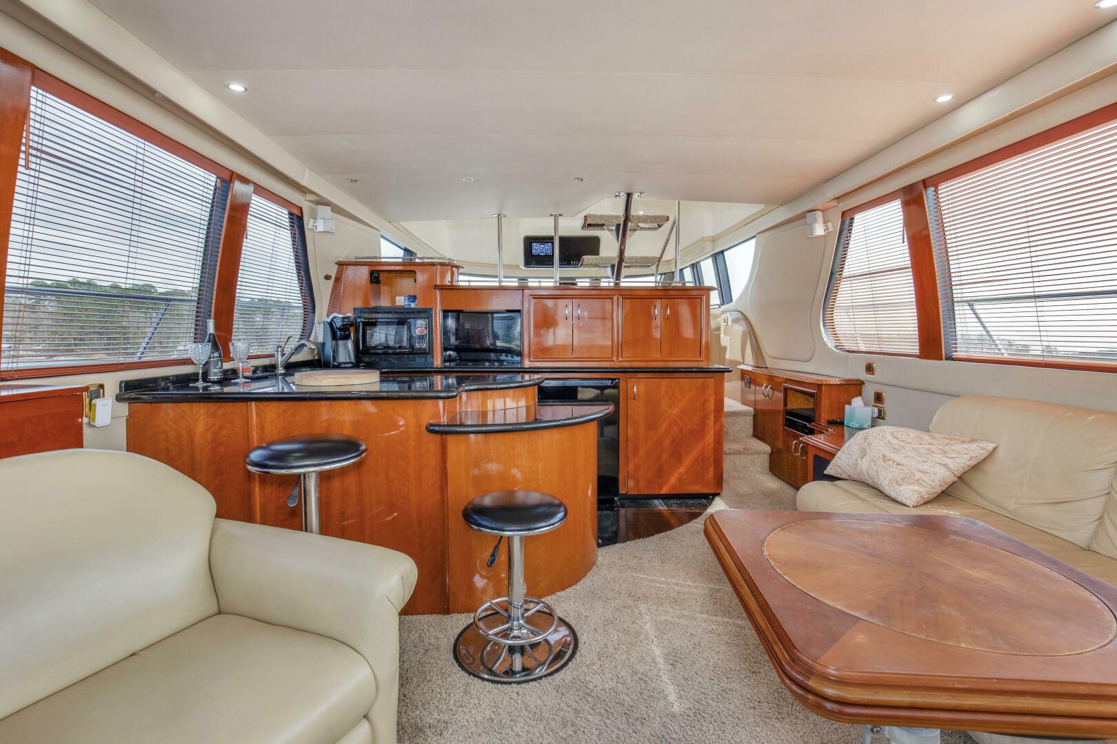 Slide: The Image of 2003 57' Carver 570 Voyager Beautiful Salon And Galley (2) - 4317392