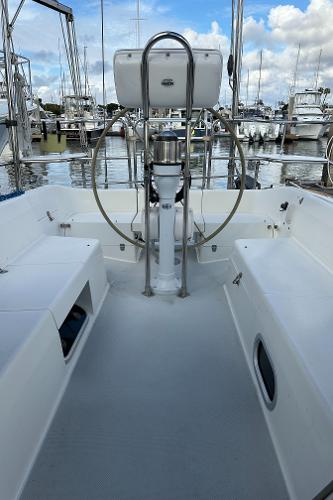 Slide: The Image of 2000 Catalina 34 MkII sailboat cockpit with steering wheel, docked in marina. - 7
