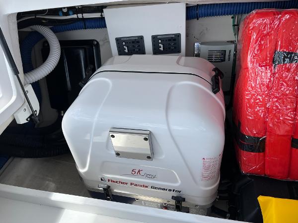 Slide: The Image of 2024 Catalina 355 engine compartment with Fischer Panda generator. - 17