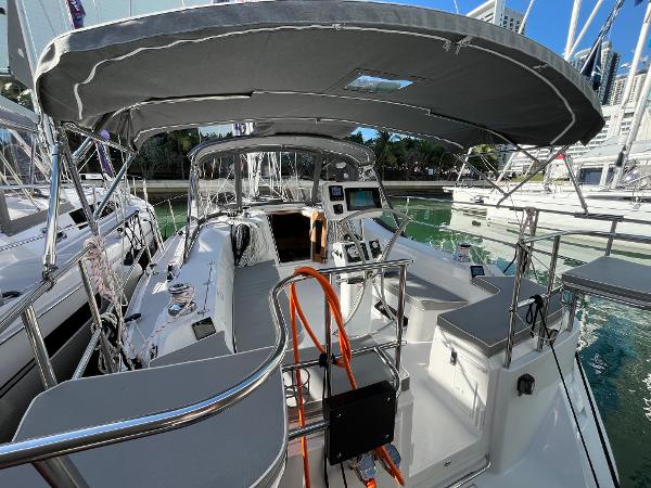Slide: The Image of 2024 Catalina 355 sailboat cockpit with modern navigation equipment and canopy. - 8