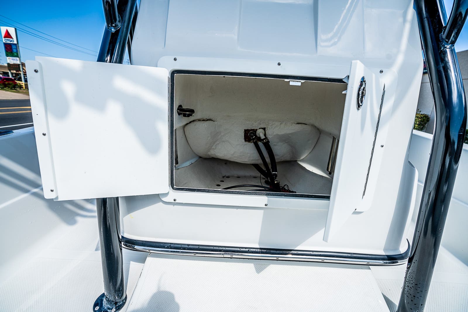 Slide: The Image of Open storage compartment on a 2021 Catalyst 2300 BAY boat. - 9