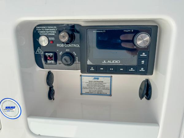 Slide: The Image of Control panel of 2023 Caymas 26 HB boat with JL Audio system and RGB controls. - 12
