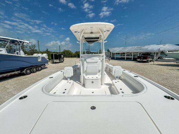 Slide: The Image of 2023 Caymas 26 HB boat with center console and spacious deck. - 22