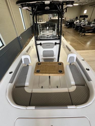 Slide: The Image of 2024 Caymas 26 Hybrid boat interior with seating and table. - 12