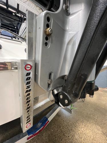 Slide: The Image of 2024 Caymas 26 Hybrid boat with Bob's Machine Shop hydraulic jack plate. - 6