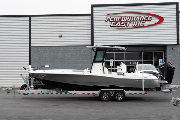 Slide: The Image of 2024 Caymas 28 HB boat on trailer at Performance East Inc. dealership. - 1