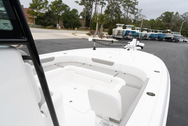 Slide: The Image of 2024 Caymas 28 HB boat with spacious seating and modern design. - 13