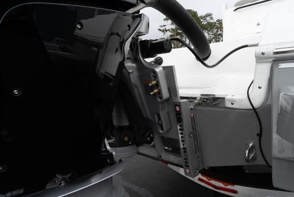 Slide: The Image of Close-up of the 2024 Caymas 28 HB boat engine and mounting bracket. - 4