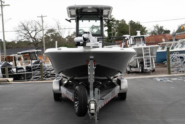 Slide: The Image of 2024 Caymas 28 HB boat on a trailer, front view. - 5