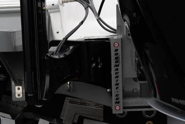 Slide: The Image of 2024 Caymas 28 HB boat engine mount detail with wiring and components. - 8