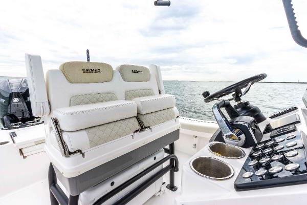 Slide: The Image of 2022 Caymas 281HB Center Console boat interior with dual seats and steering console. - 45