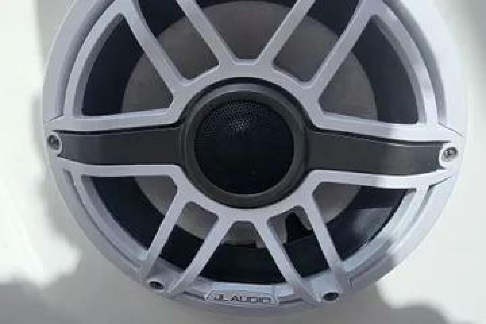 Slide: The Image of JL Audio speaker on 2023 Caymas 28 HB Twin boat. - 5442551