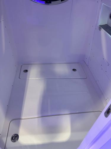 Slide: The Image of 2025 Caymas 30 CT boat interior cabin with white flooring. - 33