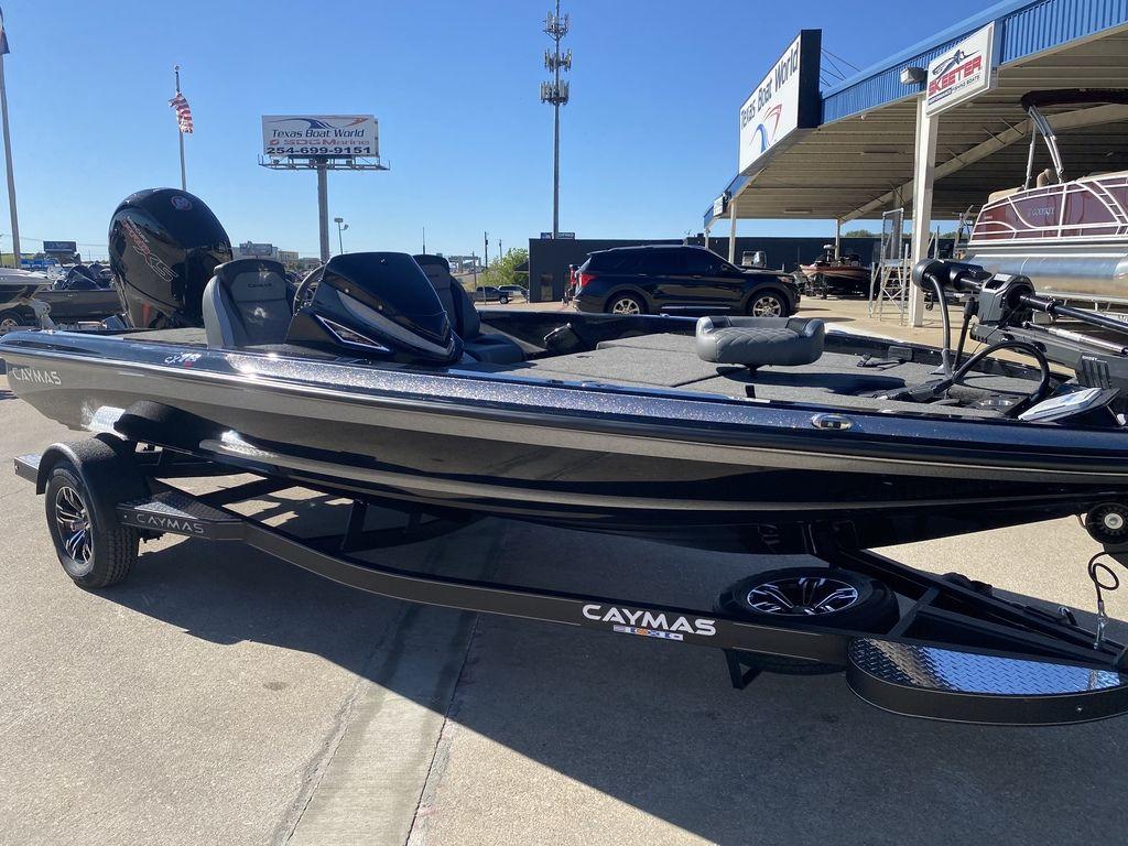 Slide: The Image of 2023 Caymas CX18 SS boat on trailer at dealership. - 10