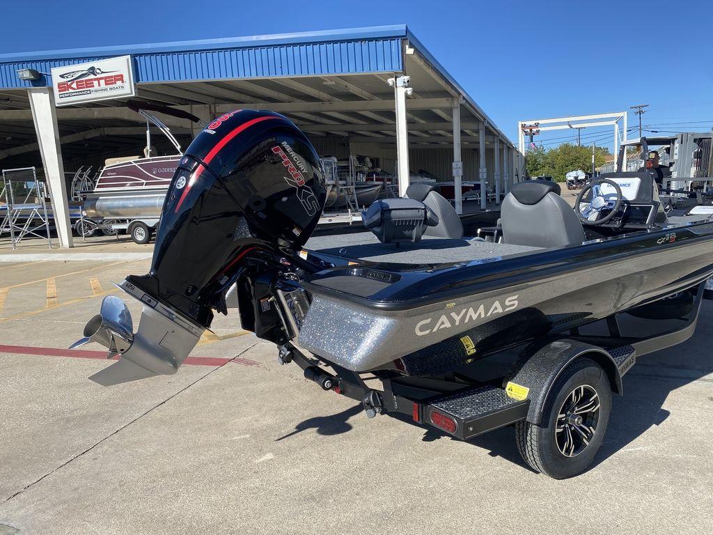 Slide: The Image of 2023 Caymas CX18 SS fishing boat with Mercury Pro XS engine at dealership. - 6