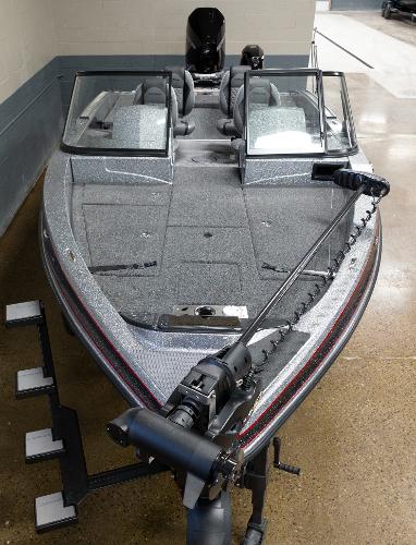 Slide: The Image of 2023 Caymas DV 20 fishing boat with dual consoles and trolling motor. - 1