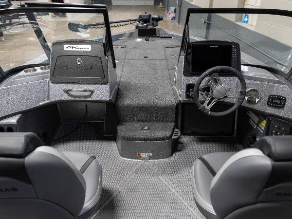 Slide: The Image of 2023 Caymas DV 20 boat interior with modern dashboard and seating. - 16