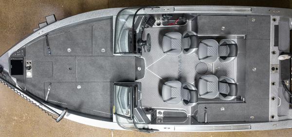 Slide: The Image of 2023 Caymas DV 20 boat interior with seating and control console, top view. - 2